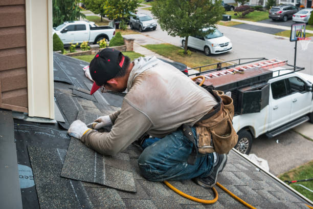 Professional Roof Replacement technician working in Garfield, TX